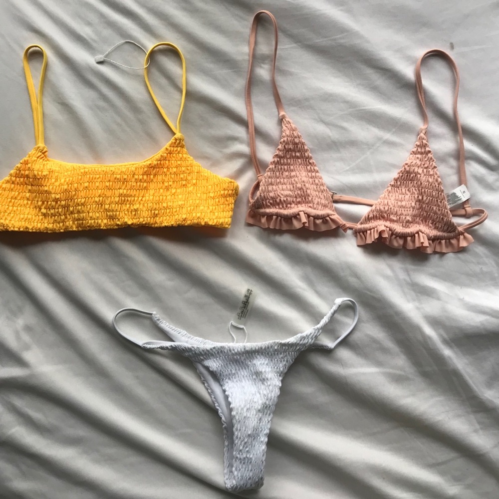 Two smocked bikini tops and one bottom NWT